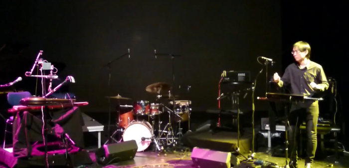 Wei-Chi Chien improvises with a robot thereminist during a concert in Germany, 2016.